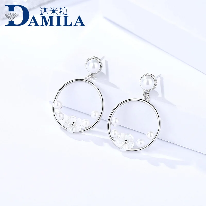 2 silver earrings for women