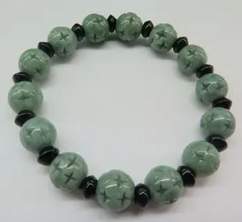 

Natural Grade A Jade (jadeite) 10mm Oil-Green Carved Round Bead Bracelet