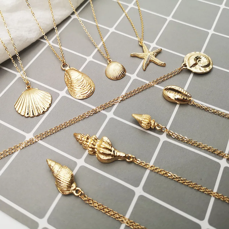 

Women Necklace Gold Color Ocean Sea Shell Conch Starfish Pendant Necklace Link Statement Necklace Beach Jewelry