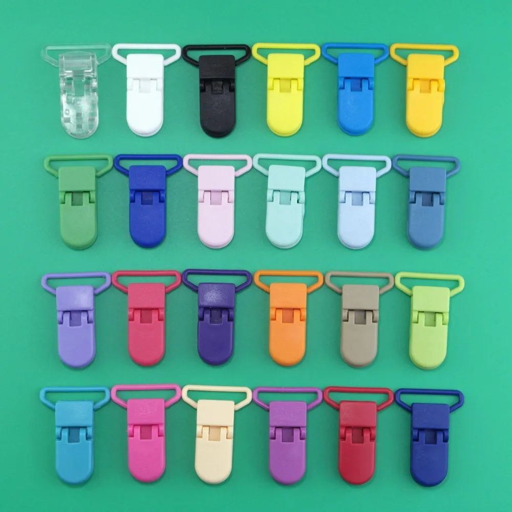 

Sutoyuen 100pcs 20 Colors 25mm D Shape Kam Fashion Baby Pacifier Clip Candy Colors Plastic Clip Suspender Binder Soother Clip