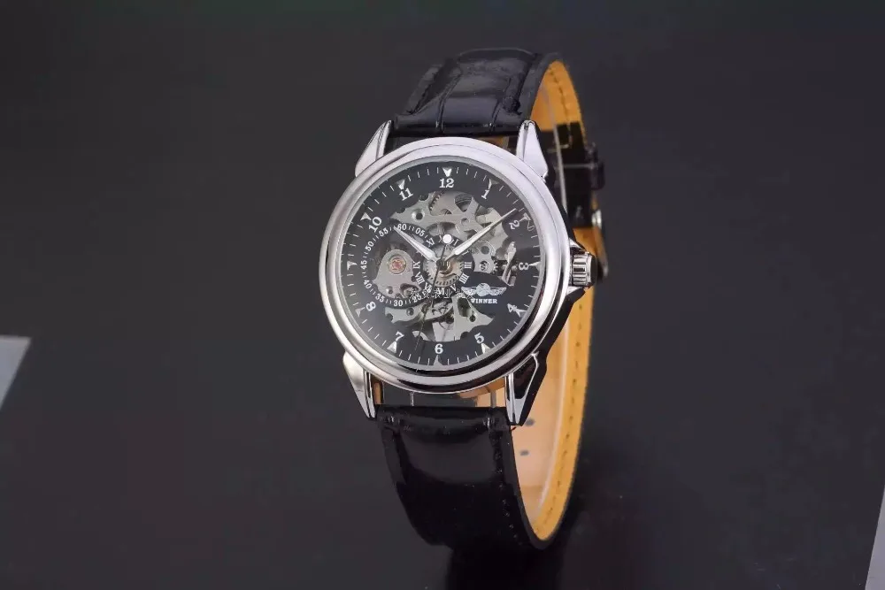 

Authentic winner winners man Fully automatic hollow out mechanical watches Skin restoring ancient ways with a watch