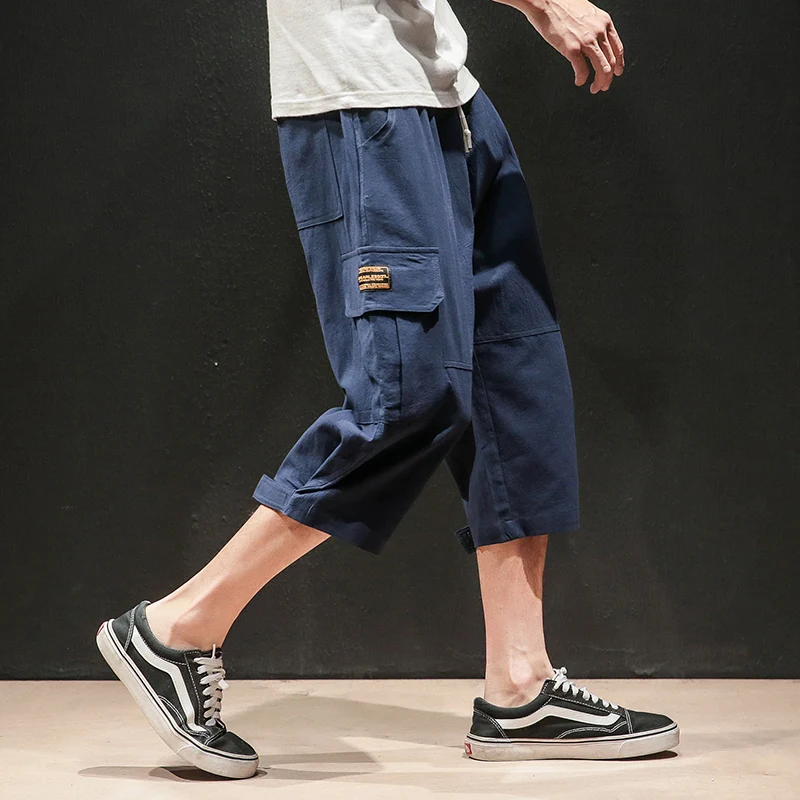 

Safari Style Calf-Length Pants Multi-Pockets Solid Color Men's Pants Elastic Waist Large Size Calf-Length Pants