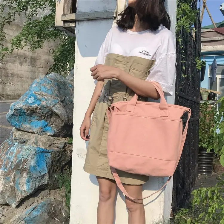 

Japanese-style large-capacity literary Mori solid color canvas handbag simple wild high school student slung shopping bag female