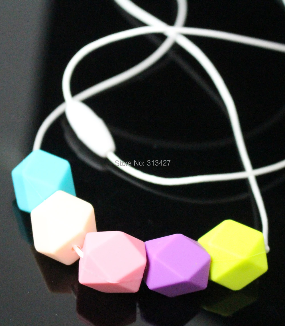 

Geometric Silicone Chew Bead Cluster Necklace Modern Tribal Chic bead teething necklace color block