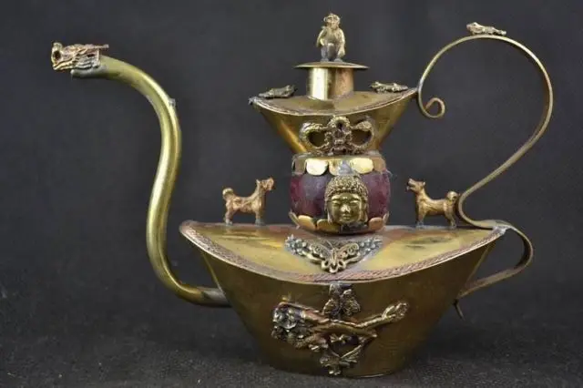 

Old Tibetan silver Jade Carving Buddha dragon Ornamental Teapot monkey Garden Decoration 100% real Tibetan Silver Brass