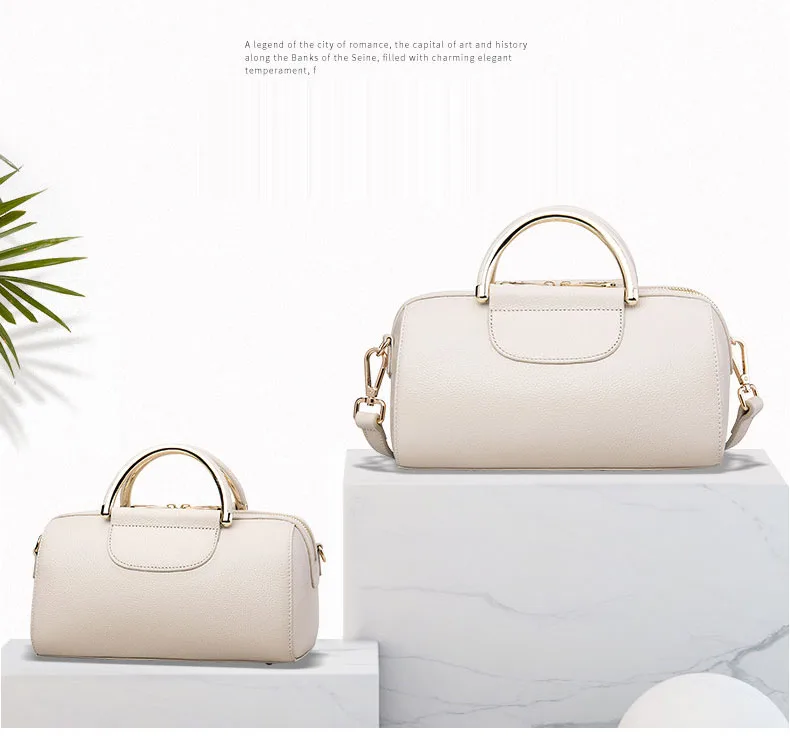 Luxury novel pillow-shaped designer genuine leather women handbags high quality simple casual round hard handle women bag