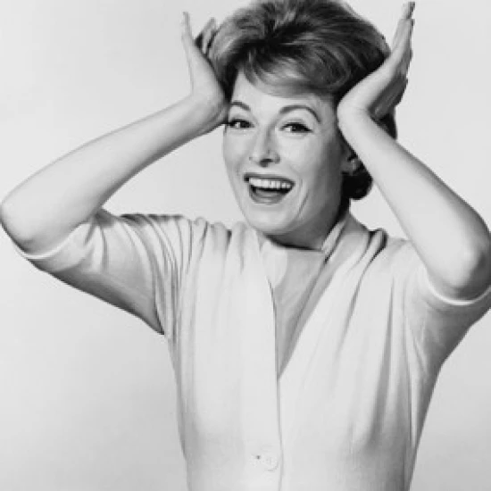 Portrait of a mature woman with her head in her hands Poster Print (24 x 36)