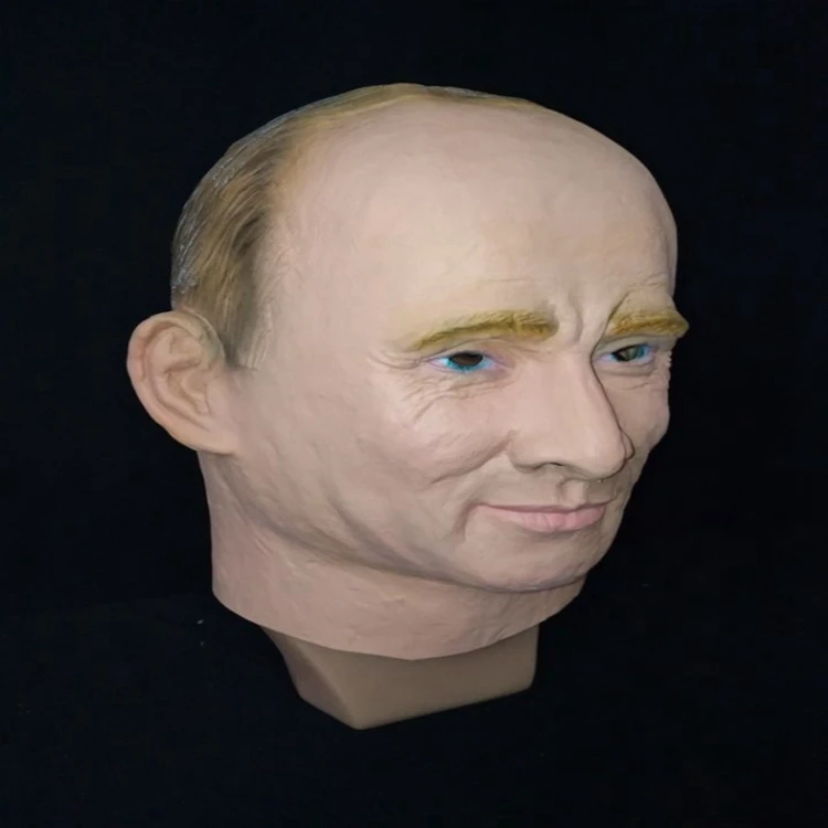 realistlik lateksist mask, millel on heledad juuksed ja sinised silmad