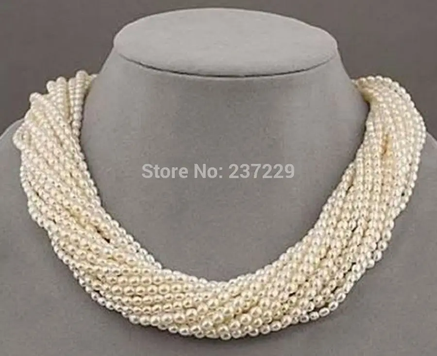 

8 strands Very beautiful AAA+ south sea white seed pearl twisted necklace 18"