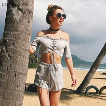 DISFRUTAR Two piece set women sexy slash neck bandage short tops with drawstring shorts 2018 summer beach streetwear chic suit