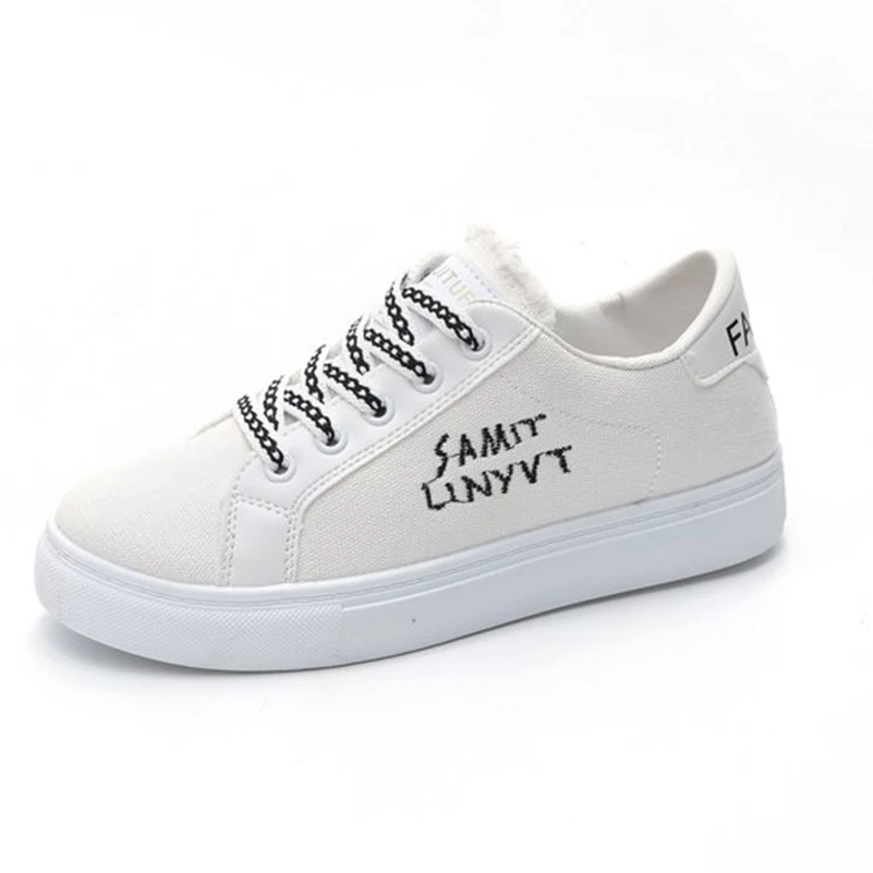 white flat canvas shoes