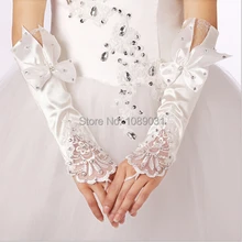 Новое поступление модные белые/Свадебные перчатки цвета слоновой кости с кружевная Апликация бант свадебное платье Элегантные без пальцев Свадебные аксессуары
