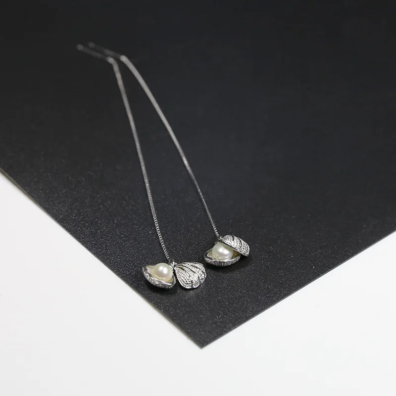 

Beautiful Shell Pearl in Shell 925 Sterling Silver Dangling Earrings