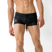 Сексуальные плавательные мужские трусы, нейлоновая одежда для плавания с низкой талией для мужчин, черное бикини на завязках, мужские плавки, шорты для серфинга, эластичные мужские трусы с принтом