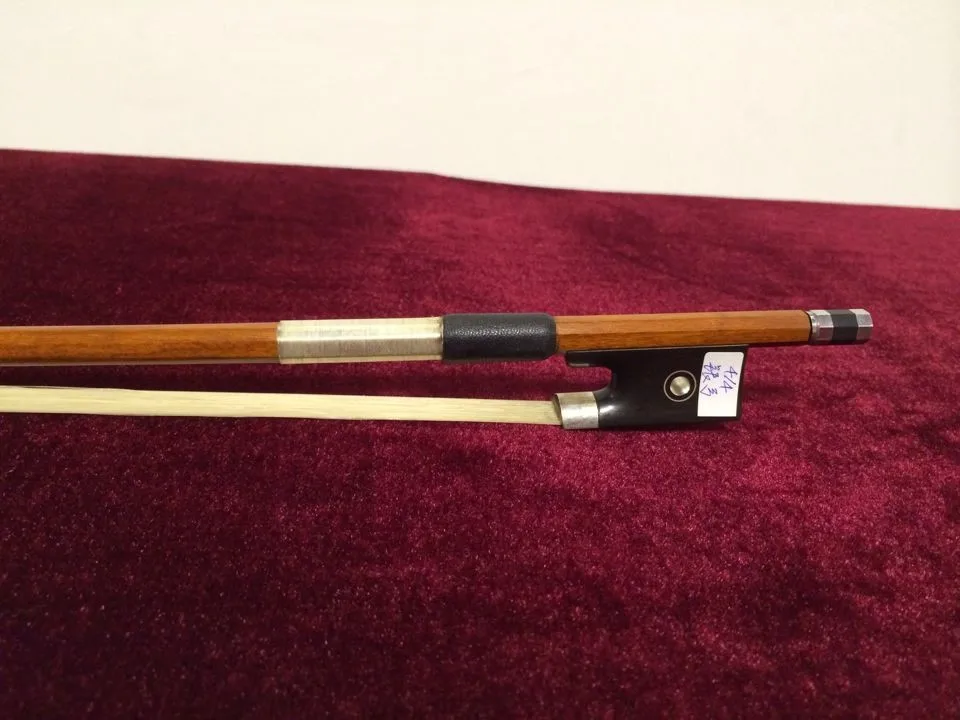 

Silver octagonal violin bow made by brazilwood and horse tail hair