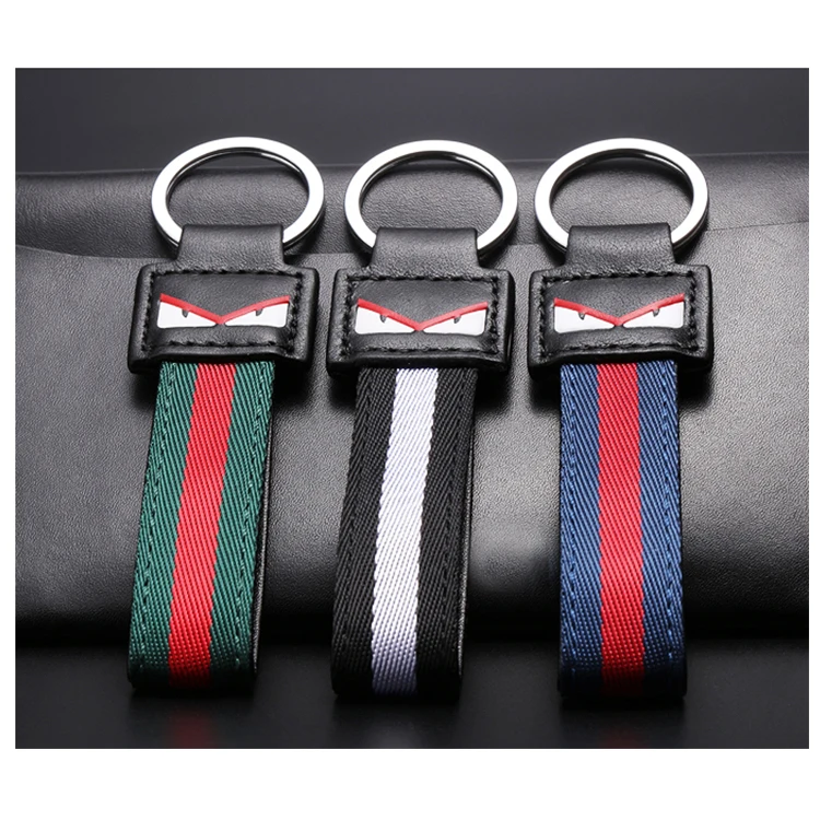 Cuero de lujo llavero monstruo Cuero auténtico coche llavero masculina cintura colgante llavero auto llavero encanto abalorio colgante