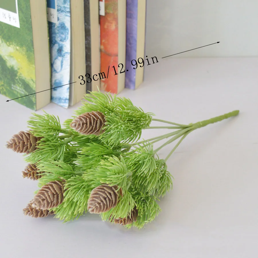 Plástico artificial Pino 7 ramas piñones conos plantas falsas árbol para decoración de fiesta de Navidad hierba falsa Navidad decoración del hogar Plástico artificial Pino 7 ramas piñones conos plantas falsas árbol para decoración de fiesta de Navidad hierba falsa Navidad decoración del hogar