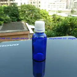 30 мл, синее стекло бутылка эфирного масла с белой пластиковая защита от взлома крышки. Пузырек для масла, контейнер для эфирного масла