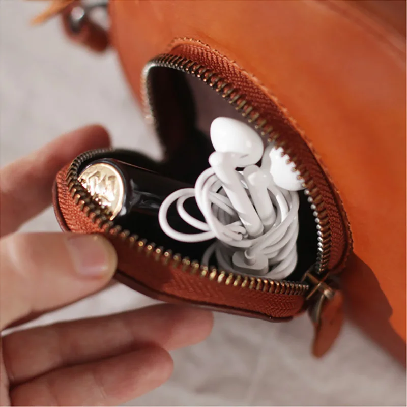 AETOO Vintage cowhide Round bag, cute sprout handmade leather female bag, literary shoulder bag