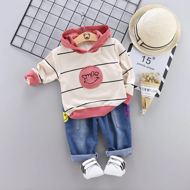 New Casual Autumn New Children's Baby Suit Striped Smiley Hooded Cartoon Long-sleeved T-shirt Top + Jeans Two-piece Clothing