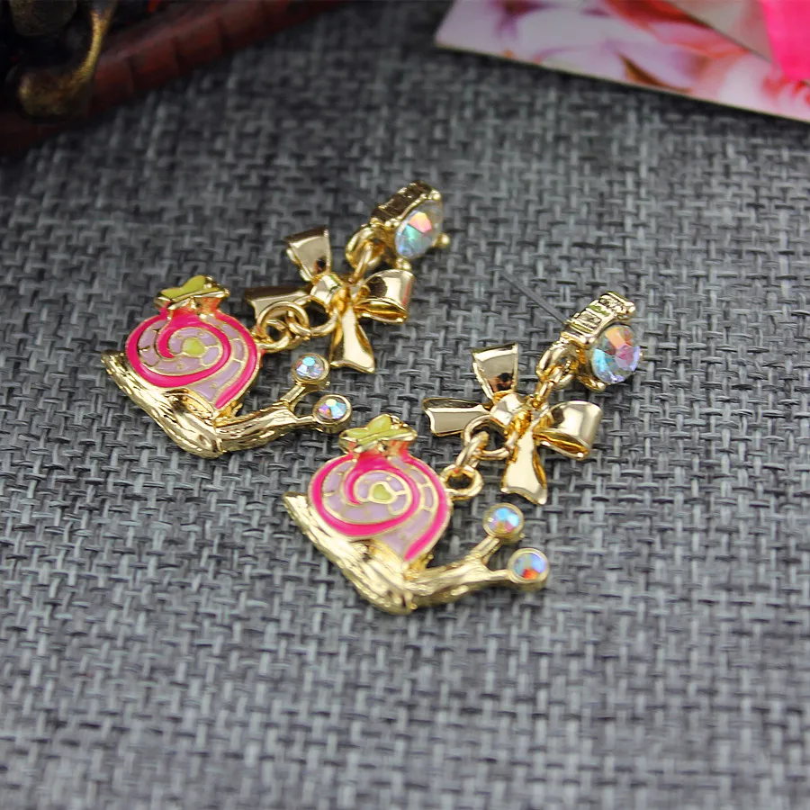 

Fashion stud earrings 2014 Fashion new pure and fresh quietly elegant simplicity and lovely snail pendant earrings 0327