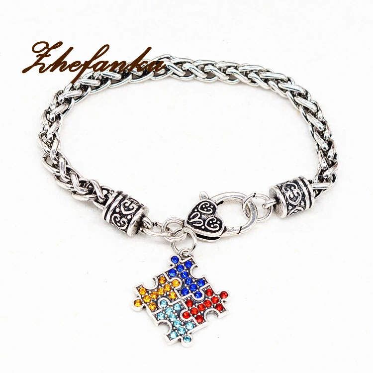 

Antique Silver Coor Hope Multi-Colored Crystal Puzzle Pendant Claw Bracelet