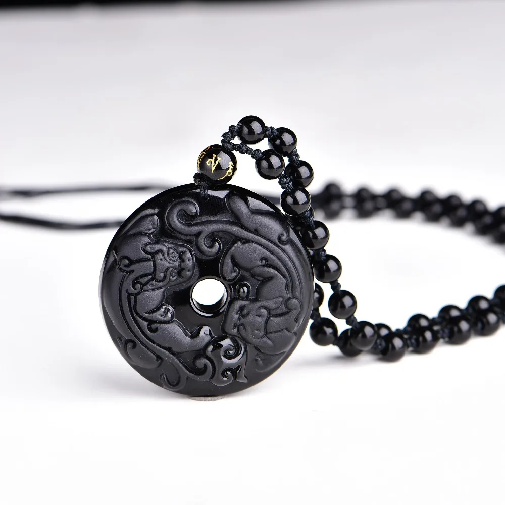 

Natural obsidian stone carving pendants, men and women lovers pendants, double the mythical wild animal