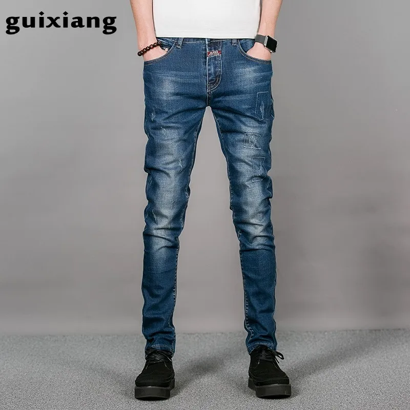 

2017 Spring new style men leisure printed jeans men's high quality famous brand broken hole do the old design embroidered jeans