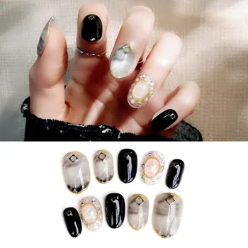 

24Pcs Pre-designed Marble False Nails Black Full Cover Round Fake Nails Tips with Golden Rivet and Rhinestone