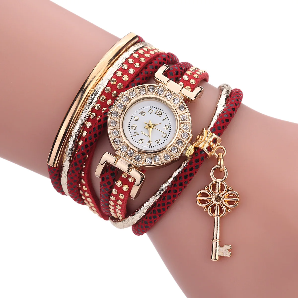 

Winding Bracelet Watch Gold Key Pendant lady quartz watch
