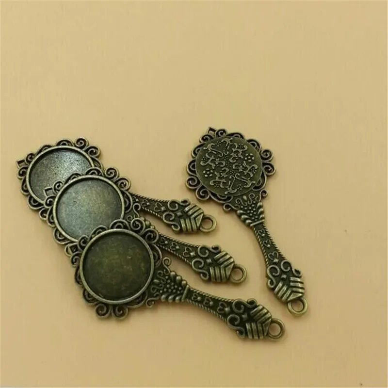 

Bronze Silver Cameo Setting Mirror Charms Tray Base 18mm Cabochon Setting Tray Alloy Diy Mirror Pendant 10pcs T079 Free Shipping