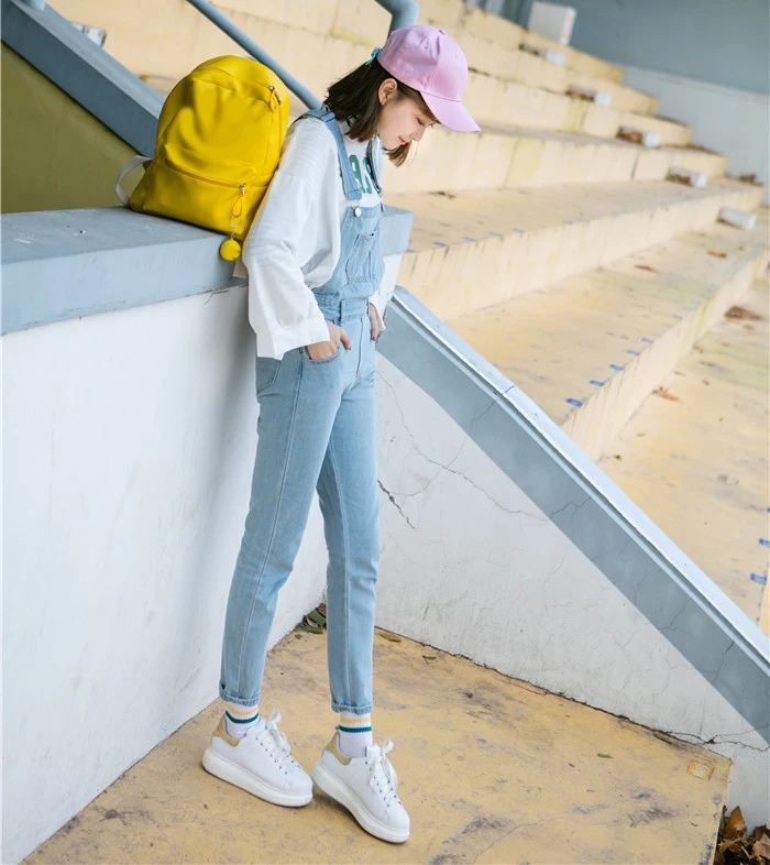 Autumn and winter Korean women's high waist row buckle show thin light color loose nine points jeans suspenders small feet suspender (3)