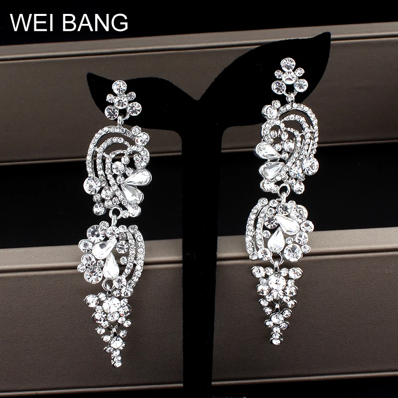 

weibang Shiny crystal long silver colored earrings Numerous female stars pendant Christmas gifts dropshipping