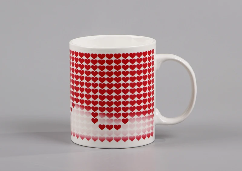 An adorable I Love You Magic Temperature Changing Mug that makes a great gift for the love in your life for Valentine's day, anniversary, birthday or any special occasion.  This cool mug changes from cute hearts to I love you when a hot drink is poured into the cup.