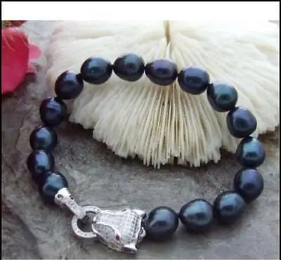 

Shipping >> fs rbt 11-13MM NATURAL BLACK SOUTH SEA BAROQUE PEARL BRACELET 7.5-8'' Leopard Clasp