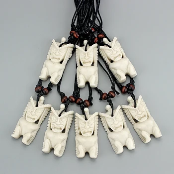

Wholesales 12pcs White Faux Tribal Yak Bone Tiki Man Totem Pendants Necklace Resin Charm Black Wax Cotton Cord