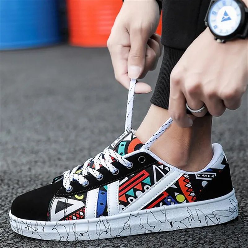 Spring and autumn new classic large size movement shoes male youth graffiti men's shoes casual wild Sneakers canvas shoes