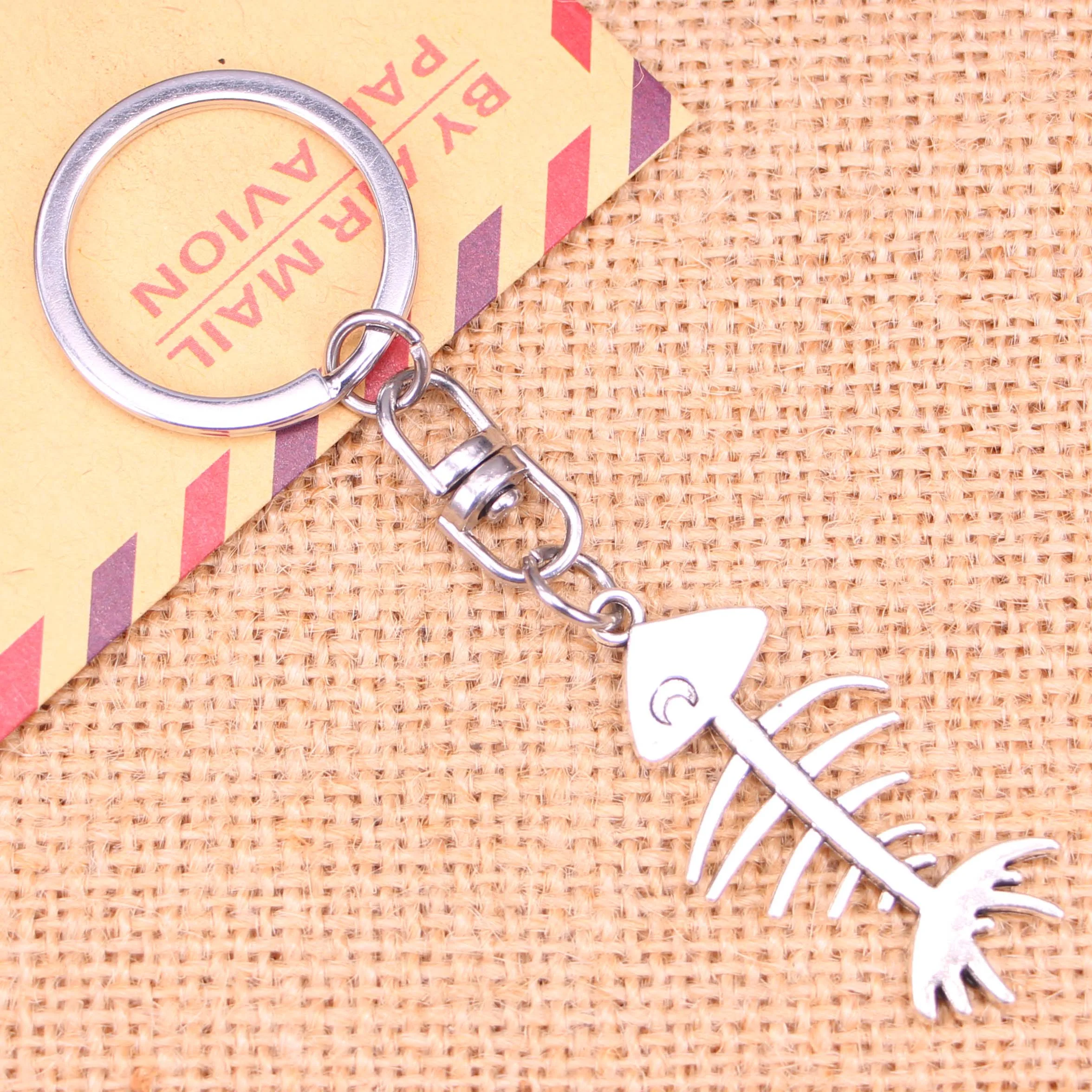 

20pcs New Fashion Keychain 42*21 mm fish bone Pendants DIY Men Jewelry Car Key Chain Ring Holder Souvenir For Gift