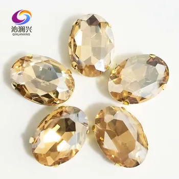 

Champion oval shape High quality Glass Crystal sew on stones,golden bottom claw rhinestone,Diy/Clothing accessories SWTG05