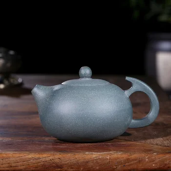 

Factory direct wholesale Genuine handmade ore green mud 'Feiba' Xishi Kung Fu teapot tea Set Yixing Purple Clay teapot