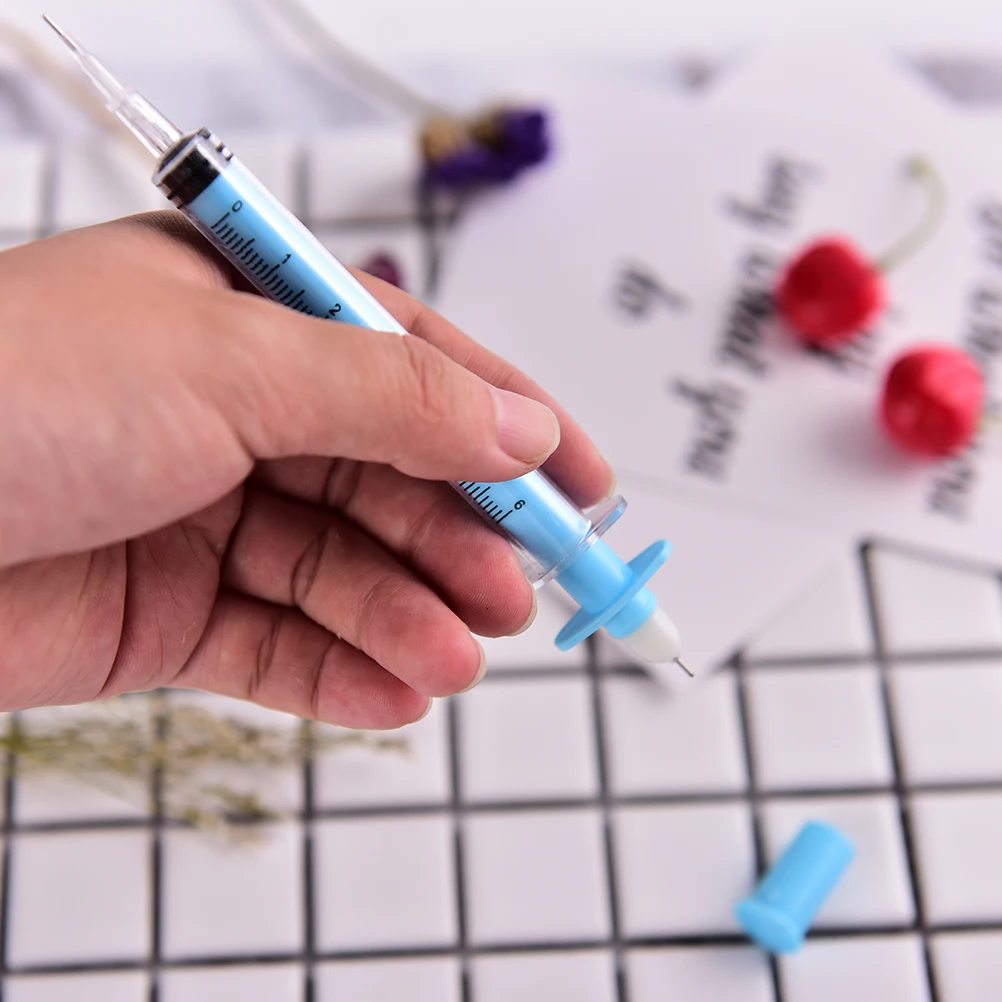 

1pcs Syringe pen Creative Design Syringe Peculiar Shape Cute Stationery Ballpoint Pen Bullet 38mm Automatic Ballpen Low Price