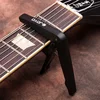 ABS plástico guitarra Capo abrazadera con púas para 6 cuerdas guitarras Folk Pop madera guitarra partes de ukelele y accesorios JOYO JCP-01 Capos ► Foto 2/6