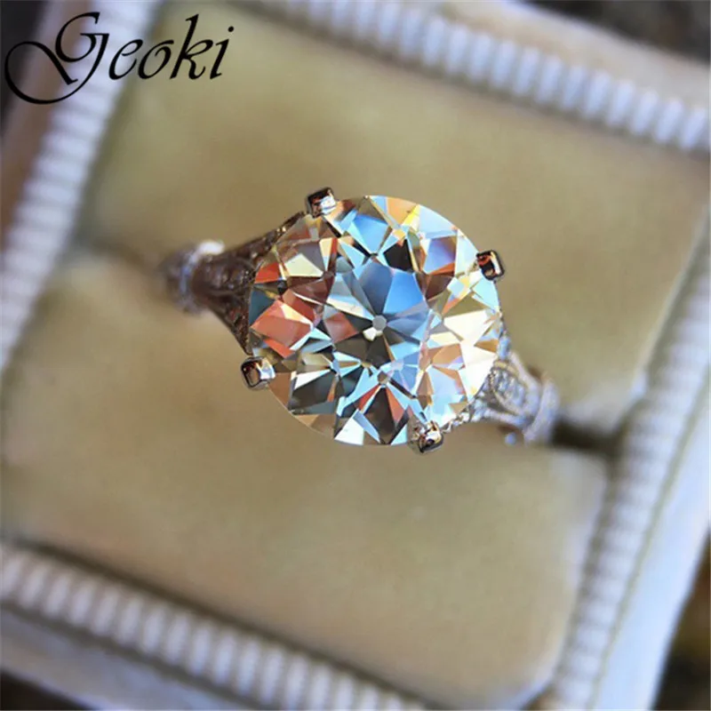 

Geoki Women Perfect Cut Brilliant Shiny Round Cubic Zirconia Wedding Ring High Quality White Gold Clarity Carats Zircon Rings