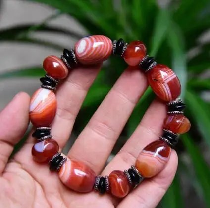 

Madagascar Banded tumbing pattern silkagate beads 20x15MM random delivery bracelet