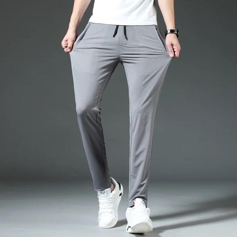 

New Casual Pants Men Simple Solid Pencil Pants Male High Quality Stretch Slim Drawstring Elastic Men Jogging pants For Spring