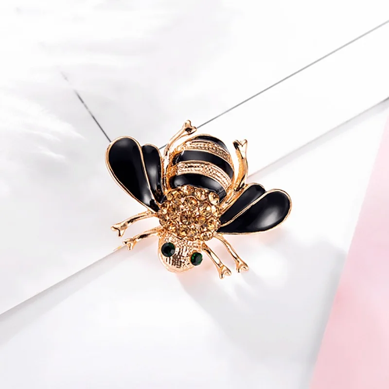 Jetting abeja Broches esmalte broches oro color Champagne rhinestone hijab Pasadores Juego de tronos Halloween joyas Jetting abeja Broches esmalte broches oro color Champagne rhinestone hijab Pasadores Juego de tronos Halloween joyas