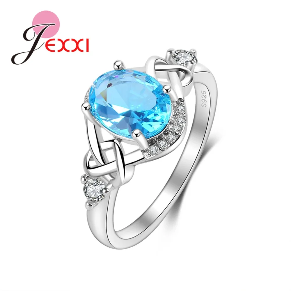 

New Stylish Finger Jewelry for Women Luxury Hollow Cross Band Paved Sky Blue Oval Zircon 925 Sterling Silver Needle Anel