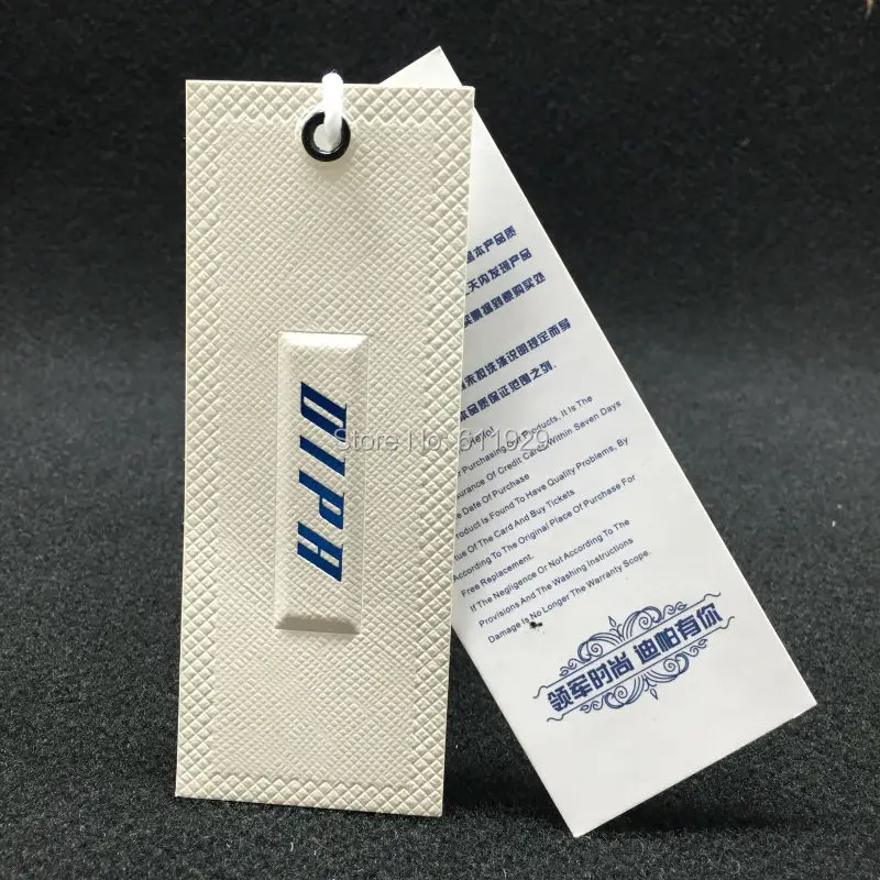 Customized top quality clothing embossed tags/garment paper tag