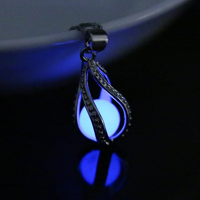 

Hollow love ring pendant luminous pendant wholesale screw can open hollow necklace night pearl pendant moonlight stone woman acc