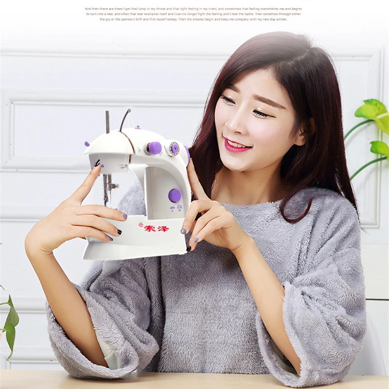 Portable ewing machines Mini Handheld sewing machines Sew needlework Cordless Clothes Fabrics Manual Household Sewing Machine